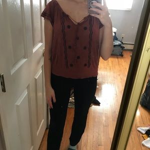 patterned burnt orange short sleeve top